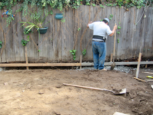 Even if you rent a trenching tool, there's still going to be a lot of digging involved in a French drain system installation. Image: EOShea/Flickr 